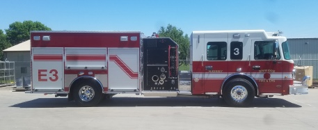 Red fire engine on pavement