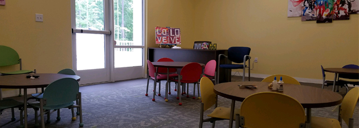 Image of a room with tables and chairs